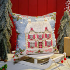 CHRISTMAS COTTAGE CUSHION WITH ADDED EMBROIDERY AND RED POM POM
